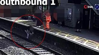 Raylara indi, tren gelmeden saniyelerle kurtarıldı